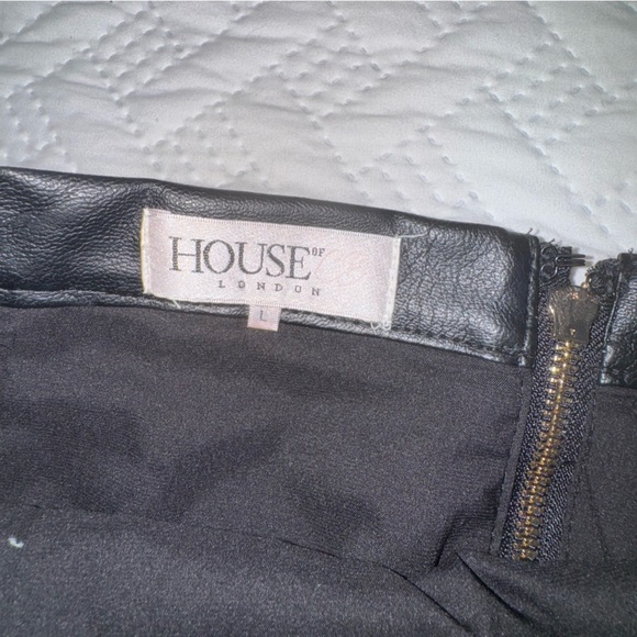 Black Faux Leather Skirt with silver Buckles - Picture 2 of 6